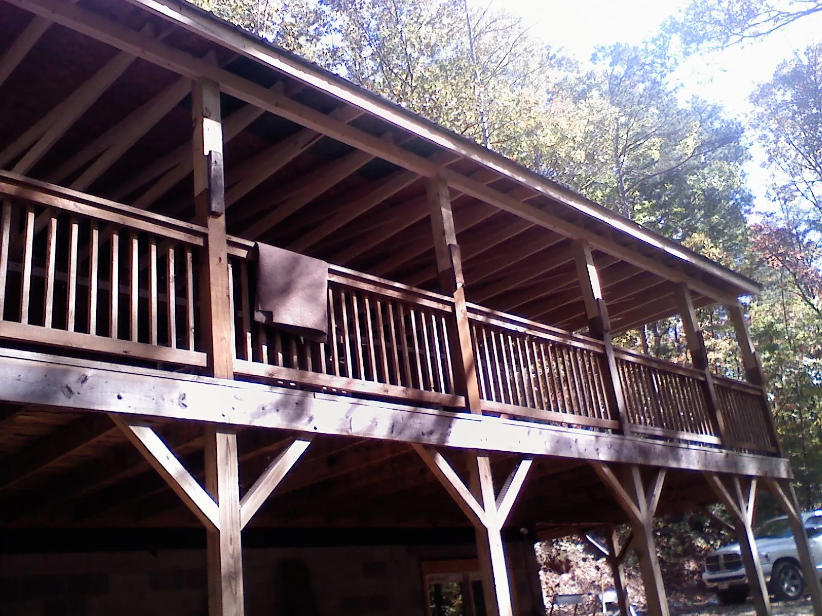 Timber framing under a new elevated porch and deck — Roof Leak Repair in Bedford by Roofing Brothers